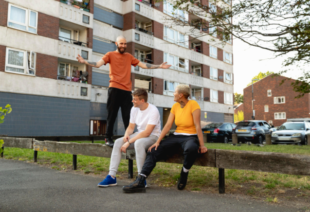 full-shot-friends-sitting-together-suburbs