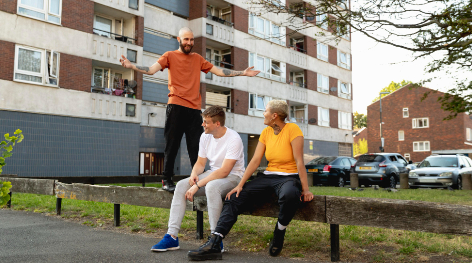 full-shot-friends-sitting-together-suburbs